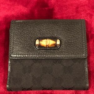 Gucci monogram wallet with bamboo closure